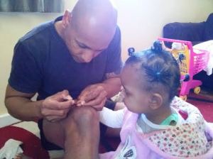 Pampering time, Painting Miss Zahra's nails after brushing her hair